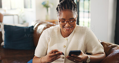 Buy stock photo Credit card, smile and black woman on sofa with phone for online shopping, web store sale and purchase. Home, relax and person on tech for internet payment, digital order and ecommerce in living room