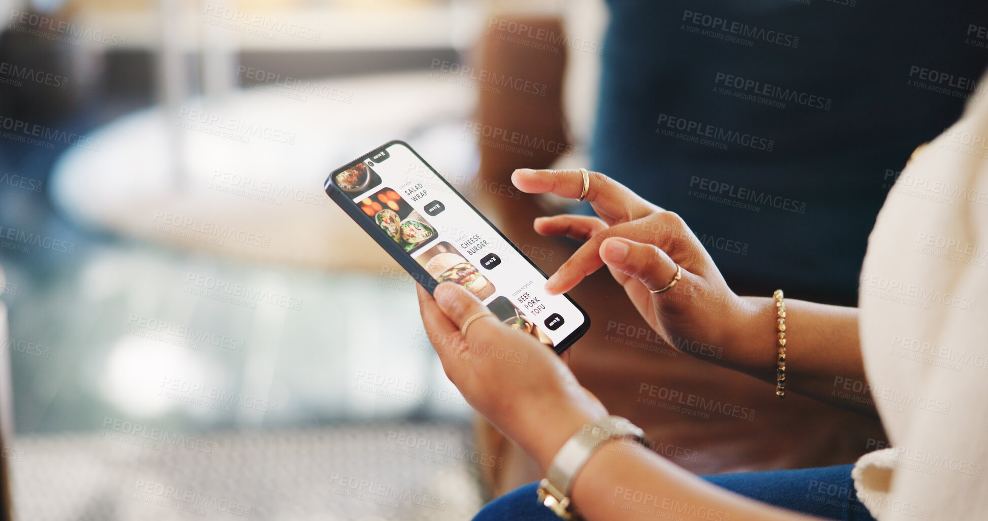 Buy stock photo Hands, phone screen and food delivery app in home with choice, scroll and online shopping in living room. Person, smartphone and e commerce for menu, order and decision for deal on sofa in apartment