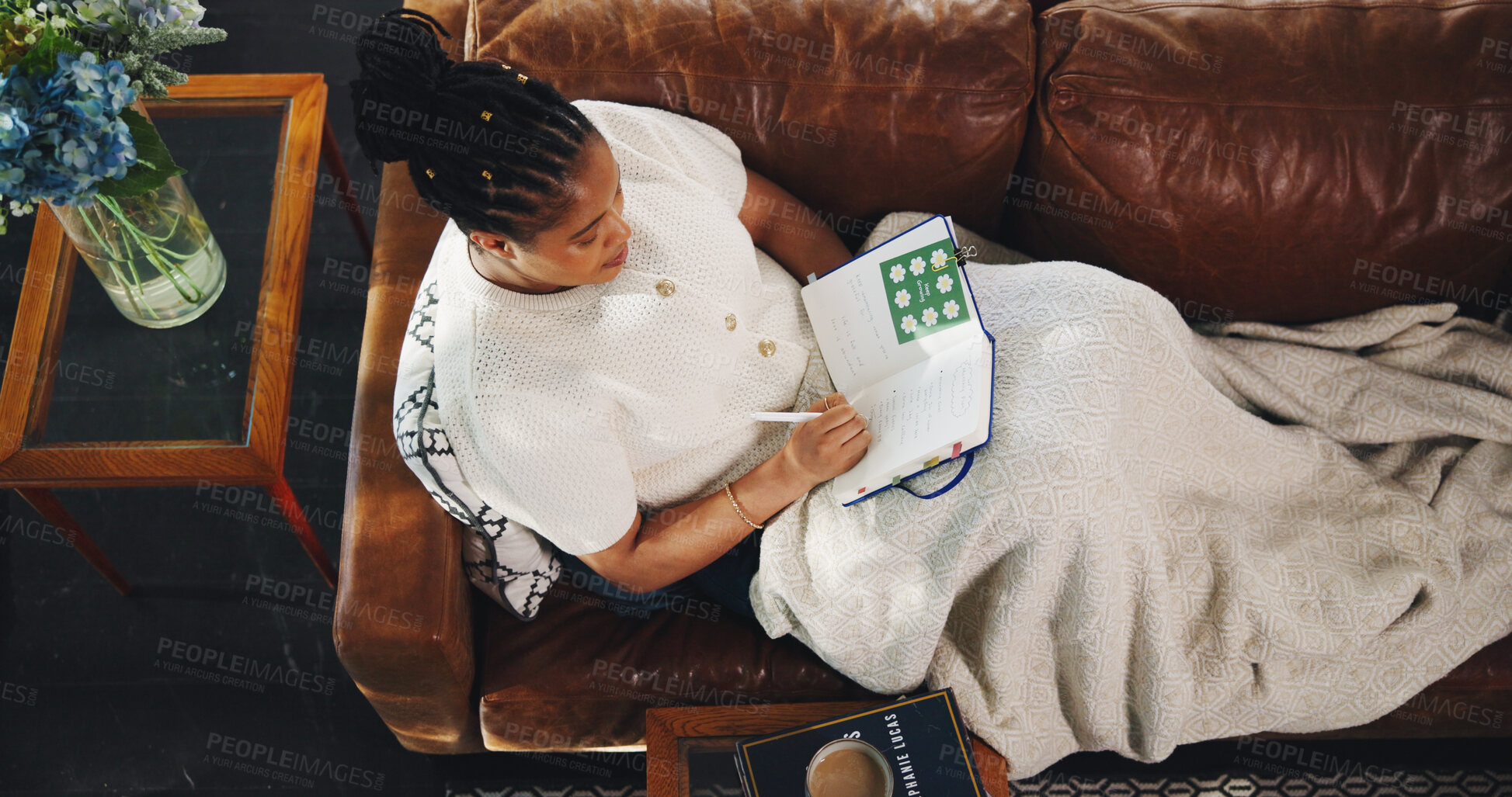 Buy stock photo Above, black woman and writing with journal in living room for planning, schedule or checklist. Creative, thinking and diary of freelancer for remote work, copywriting or ideas for article editor
