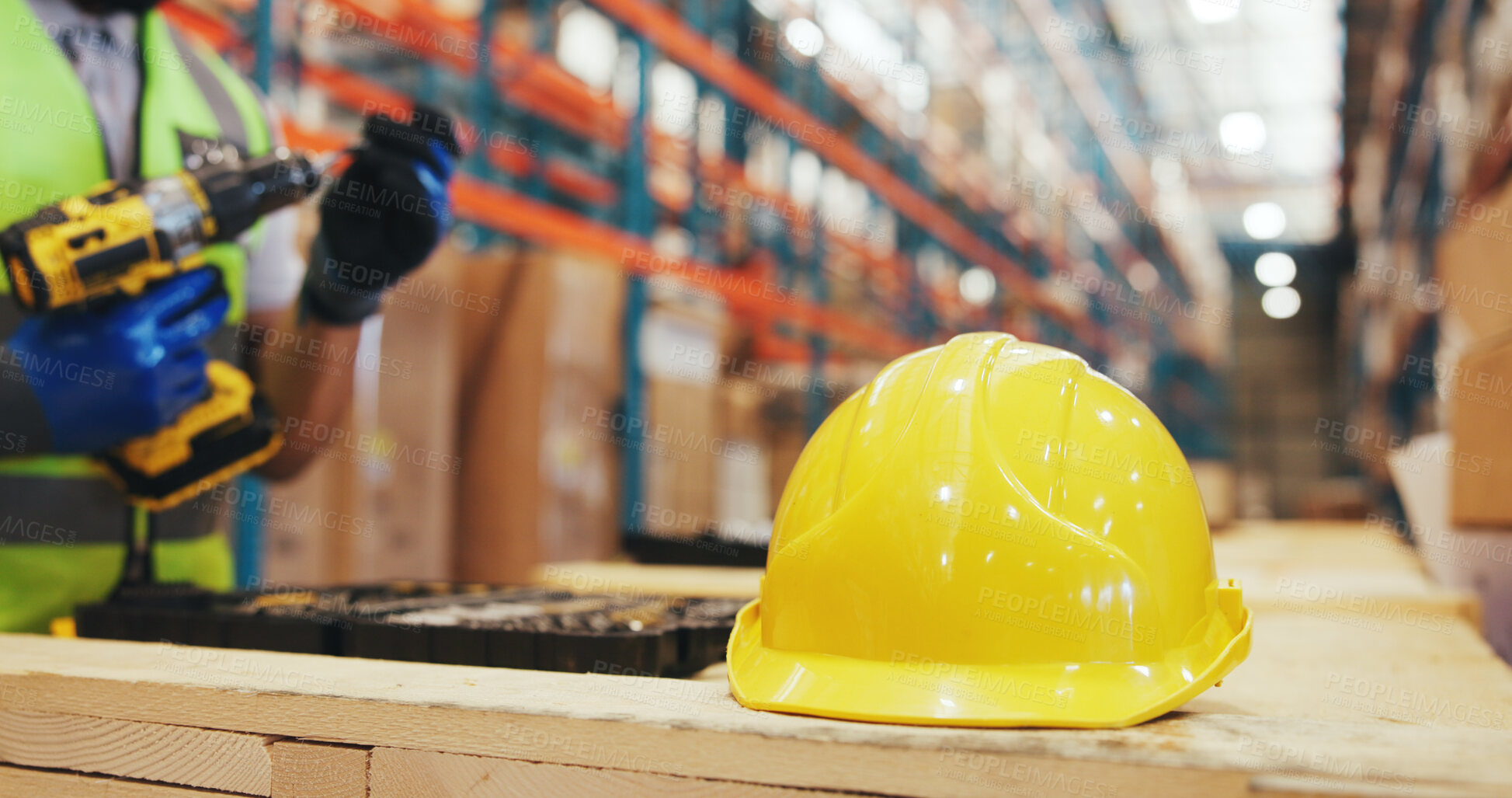 Buy stock photo Logistics, person and helmet on crate in warehouse for cargo assembly, supply chain or compliance. Shipping industry, package technician or hardhat in factory for packaging development or safety gear