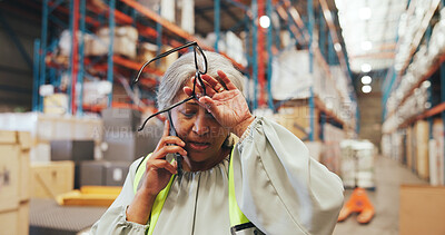 Buy stock photo Warehouse, logistics and woman with stress, phone call or discussion with contact for delivery delay. Factory, supervisor and mature person with anxiety for distribution fail, mobile and supply chain