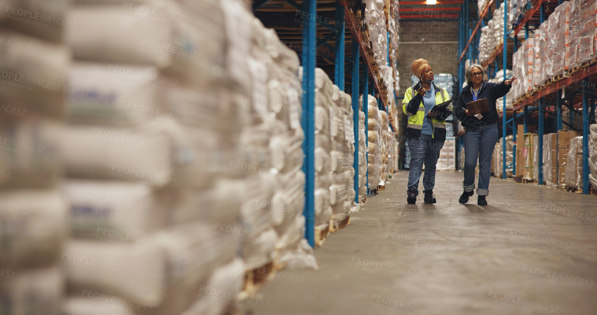 Buy stock photo Clipboard, team and logistics with people in warehouse for shipping partner, radio and quality control. Tablet, inventory manager and ecommerce inspection with employees pointing for freight