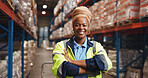 Portrait, black woman and arms crossed for logistics in warehouse with career pride, quality control and freight. Female person, dolley and about us for storage inspection, supply chain and shipping