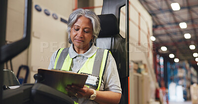 Buy stock photo Writing, clipboard and forklift with woman in warehouse for shipping checklist, supply chain and quality control. Export, inventory manager and ecommerce supplier with mature employee for freight