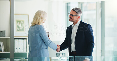 Buy stock photo Handshake, partnership and business people in office with deal, finance contract or greeting. Welcome, negotiation and financial manager shaking hands with client for investment proposal in workplace