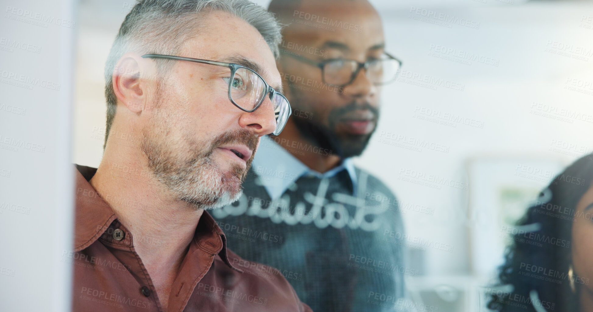 Buy stock photo Man, team and writing on glass wall at office, planning or insight with risk management solution. Mature person, group and notes on board for problem solving, strategy or feedback at insurance agency
