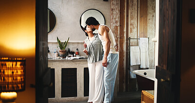 Buy stock photo Couple, kiss and self care in bathroom for night, grooming routine and caring relationship in home. Connection, love and people for support in apartment with evening, hygiene or getting ready for bed