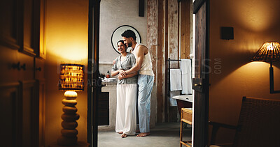 Buy stock photo Couple, smile and hug in bathroom at hotel for weekend getaway, connection or bonding together. Happy, married people and embrace in lodge for healthy relationship, holiday or vacation accommodation.