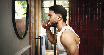 Buy stock photo Man, morning and brushing teeth with mirror in bathroom for dental hygiene or fresh breath in home. Profile, male person or cleaning mouth with toothbrush for grooming, oral or gum care in house