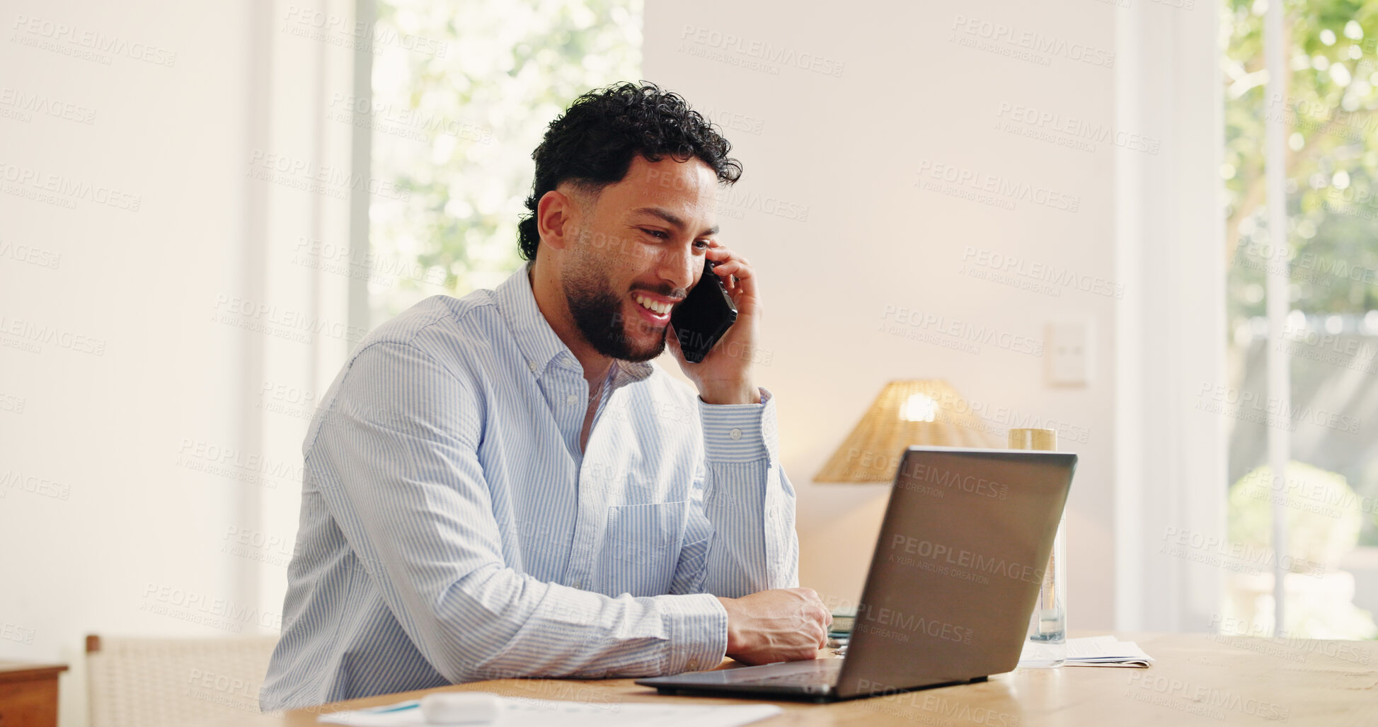 Buy stock photo Laptop, phone call and smile of business man in home office for positive feedback or research. Computer, planning and remote work with happy freelancer at desk in apartment for startup communication