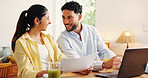 Happy couple, laptop or documents with finance in home for budget planning or expenses together. Man, woman or accounting with paperwork, invoice or computer for financial audit or bills in house