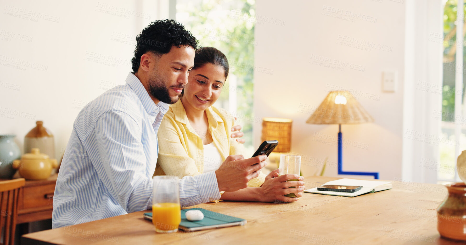 Buy stock photo Happy, planning and couple with phone in home for online booking, holiday resort and travel website. Apartment, love and man with woman on smartphone for hotel reviews, vacation ideas and research