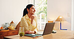 Laptop, smile and thinking with business woman in home office for online solution or research. Computer, planning and remote work with happy Indian employee at desk in apartment as startup freelancer