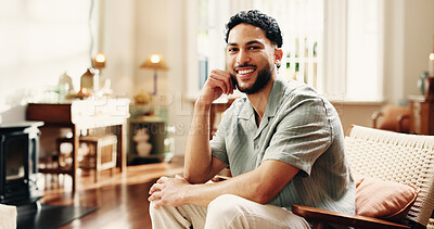 Buy stock photo Portrait, relax and smile with man in living room for comfort, rest and wellness in apartment. Chill, sofa and happy person in home with positive attitude, peace and calm with confidence in Mexico
