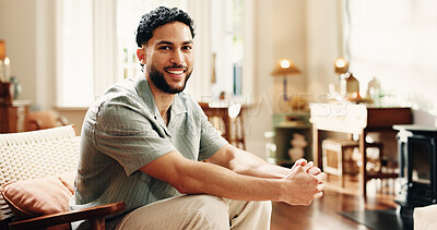 Buy stock photo Property, portrait and man in home with smile, fresh start and investment in dream house. Real estate, happy and male person in living room with pride, relocation and achievement for new homeowner.