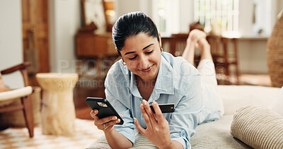 Buy stock photo Woman, credit card or payment with phone on couch for online shopping sale, purchase or internet banking. Fintech, person typing or eft transaction in home with tech, ecommerce mobile app or checkout