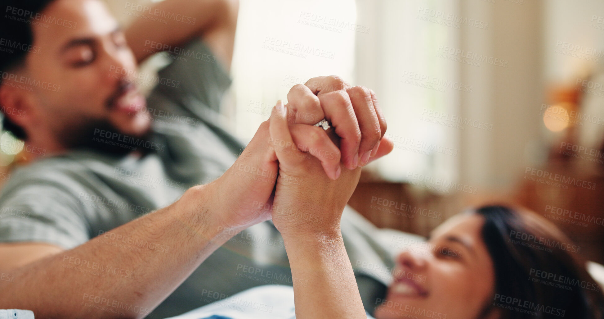 Buy stock photo Relax, holding hands and love with couple on sofa of home for connection, romance or bonding. Support, happy and trust with man and woman in living room of apartment for commitment, marriage and care