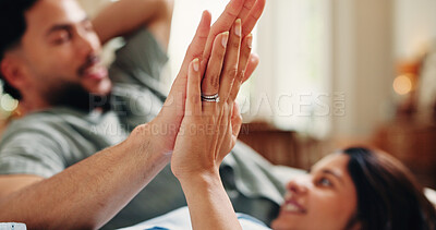 Buy stock photo Relax, hands and love with couple on sofa of home for connection, romance and bonding. Support, touch and trust with man and woman in living room of apartment for commitment, marriage and care