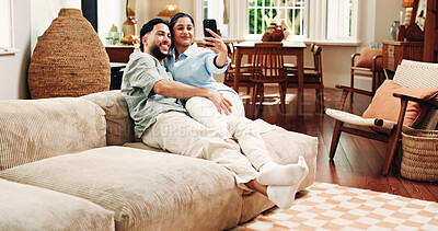 Buy stock photo Happy couple, selfie and bonding on sofa, home and web post with memory, love or relax in lounge. Woman, man and smile for photography on couch, profile picture and hug on social media at apartment
