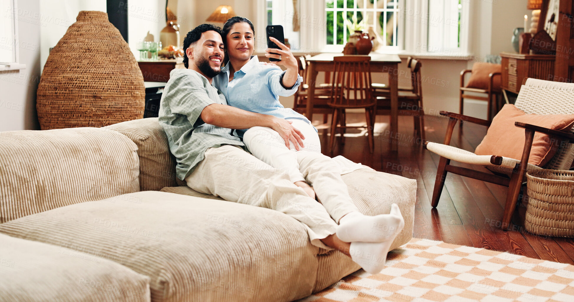 Buy stock photo Happy couple, selfie and bonding on sofa, home and web post with memory, love or relax in lounge. Woman, man and smile for photography on couch, profile picture and hug on social media at apartment