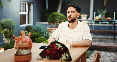 Buy stock photo Frustrated, man and waiting with roses, restaurant and annoyed by late date, valentines day or event. Diner, reservation and person with bouquet for anniversary, angry or upset with partner for delay