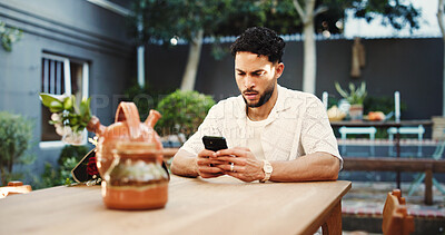 Buy stock photo Phone, waiting and worry with man in home for late schedule, online dating fail and mistake. Cancel appointment, ghosting text message and time management crisis with person on patio of house