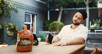Buy stock photo Phone, waiting and frustrated with man in home for late schedule, online dating fail and mistake. Cancel appointment, ghosting text message and time management crisis with person on patio of house