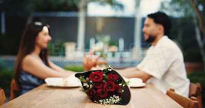 Buy stock photo Love, couple and date with roses in restaurant for romantic gift, anniversary lunch and bonding. Celebration, people and relax with flower bouquet for appreciation, healthy relationship or connection
