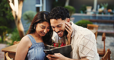 Buy stock photo Love, couple and surprise with roses in restaurant for romantic gift, anniversary date and bonding. Celebration, people and smile with bouquet at cafe for loyalty, healthy relationship and connection