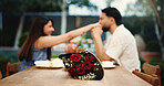 Date, roses and couple with love in backyard for anniversary celebration, hand kissing and trust. Romance, people and bonding with bouquet outdoor for appreciation, relationship or connection at home