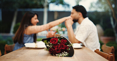 Buy stock photo Date, roses and couple with love in backyard for anniversary celebration, hand kissing and trust. Romance, people and bonding with bouquet outdoor for appreciation, relationship or connection at home