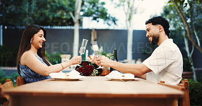 Buy stock photo Cheers, happy and couple with champagne on date outdoor for valentines day, anniversary or romance. Toast, sparkling wine and man with woman for marriage celebration in backyard at home together.