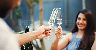 Buy stock photo Cheers, champagne and couple on date outdoor for valentines day, anniversary or romantic celebration. Toast, sparkling wine and man with woman for marriage commitment in backyard at home together.