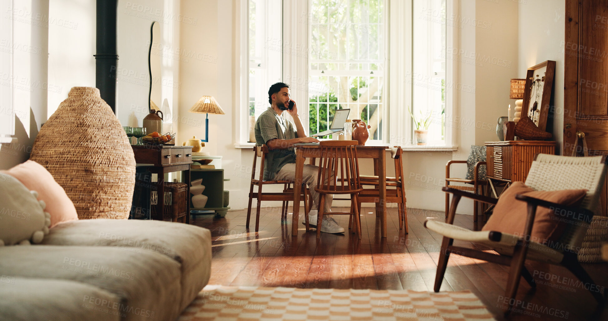 Buy stock photo Home, phone call and man in lounge, communication and digital app with conversation. Apartment, mobile user and person in living room, smartphone and calling with discussion, internet and talking