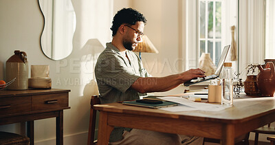 Buy stock photo Typing, man and creative with laptop, home and research for logo design on web or freelance project. Graphic designer, online and person with tech for digital art, technical skills and remote work
