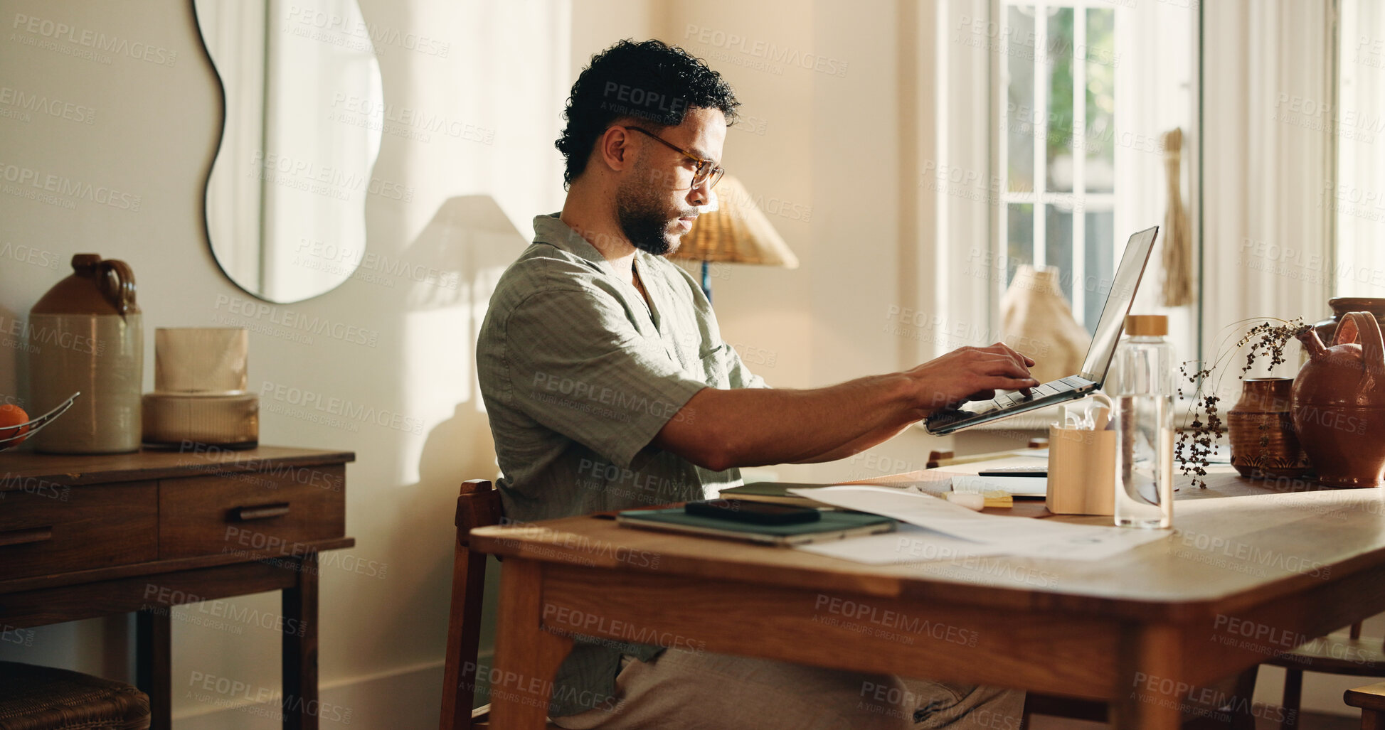 Buy stock photo Typing, man and creative with laptop, home and research for logo design on web or freelance project. Graphic designer, online and person with tech for digital art, technical skills and remote work