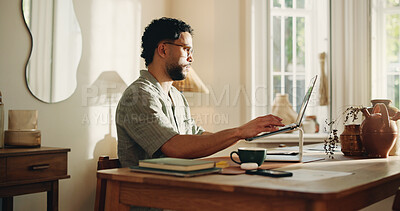 Buy stock photo Typing, man and research with laptop, home and creative for logo design on web or freelance project. Graphic designer, online and person with tech for digital art, technical skills and remote work