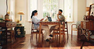 Buy stock photo Couple, reading and document with laptop at house for accounting, finance report and loan application. People, pc and review paperwork for budget, expenses information and mortgage insurance in home