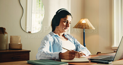 Buy stock photo Remote work from home, writing and woman with laptop, headphones and notes for creative project. Apartment, freelancer and person with computer, notebook or listening to music, radio and website info