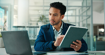 Buy stock photo Business, man and tablet with laptop at desk for finance report, budget comparison and review. Financial manager, person and tech in office for risk assessment, investment insight and market trends