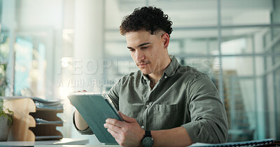 Buy stock photo Man, scroll and reading in office with tablet for social media marketing, campaign post or SEO report. Person, browse and review with tech for digital advertising, project upload or brand management.