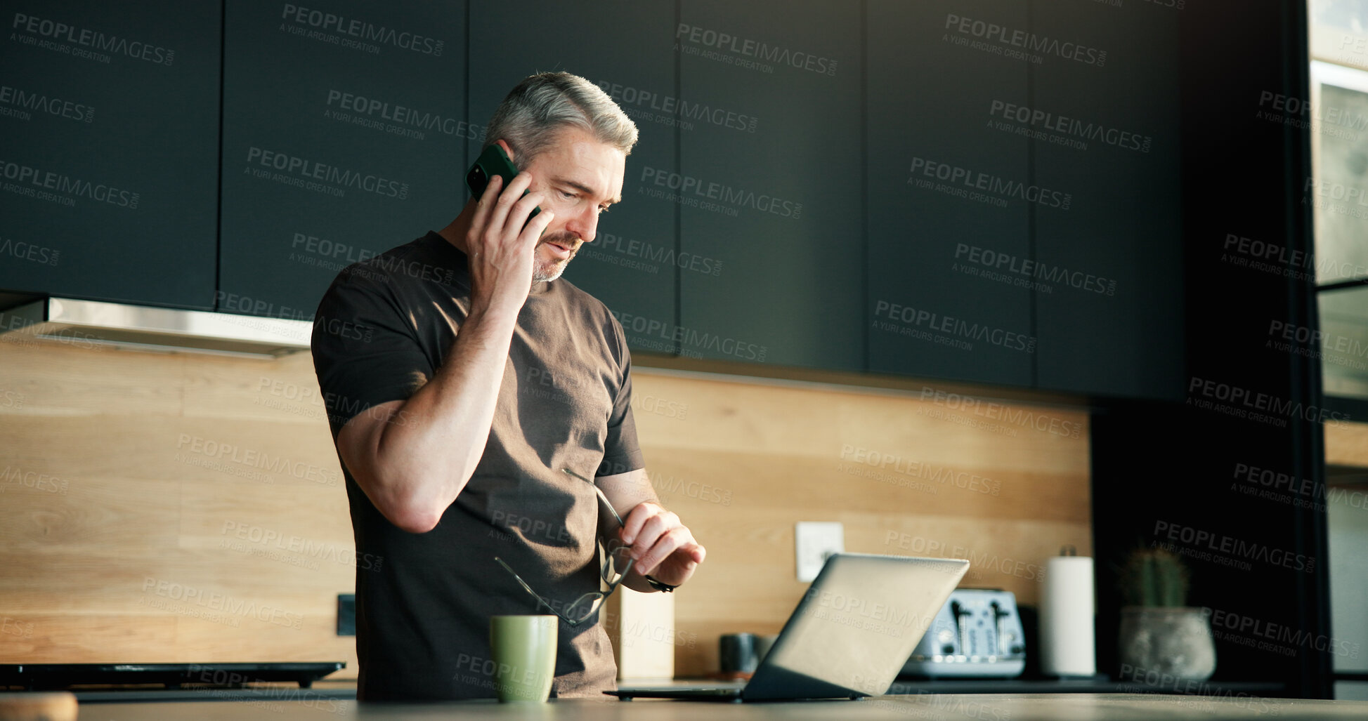 Buy stock photo Phone call, review or man in home with laptop, source contact or magazine update in remote work. WFH, mature or journalist in house with tech, networking or story pitch for digital publication.