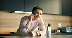 Discussion, phone call and man with smile in kitchen, listening and conversation for networking. Contact, online chat or person with mobile app for communication in home, relax or internet connection