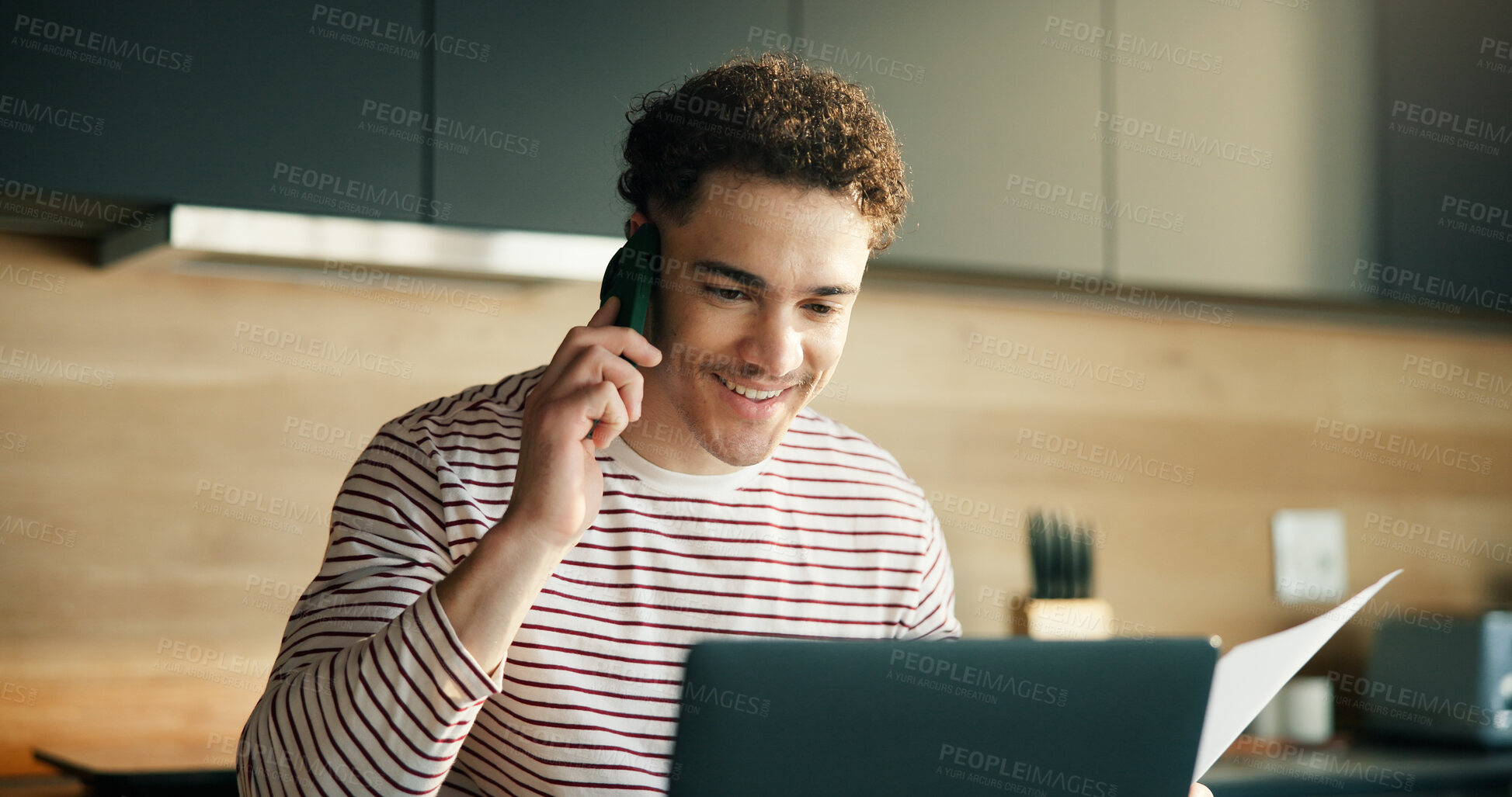 Buy stock photo Documents, laptop and phone call with man in kitchen of home for planning, report or update. Computer, conversation and paperwork with happy freelance employee in apartment for feedback or review