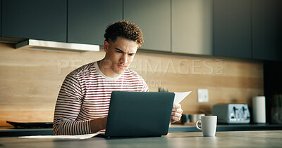 Buy stock photo Documents, laptop and remote work with man in kitchen of home for problem solving or solution. Computer, paper and reading with confused freelance employee in apartment for planning or review