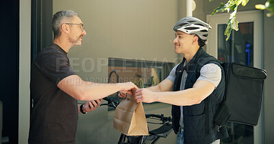 Buy stock photo Bike messenger, delivery and package with man at front door of home for receipt of online order. Bicycle courier, parcel and retail with customer at entrance to apartment for ecommerce shipping