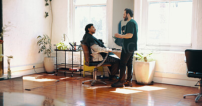 Buy stock photo Man, barber and talk with client for hairstyle choice, offer and explain services at salon. People, hairdresser and discussion with decision for grooming, haircut or conversation at barbershop