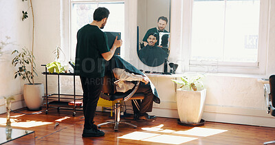 Buy stock photo Consultation, mirror and barber with client in salon for haircut, maintenance or discussion. Appointment, conversation and male hairdresser with customer for trim, hairstyle or self care in parlor.