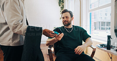 Buy stock photo Happy man, hairdresser or customer paying with phone for payment, banking or pos machine in salon. Male people, barber or client with mobile smartphone for NFC tap or wireless transaction in parlor