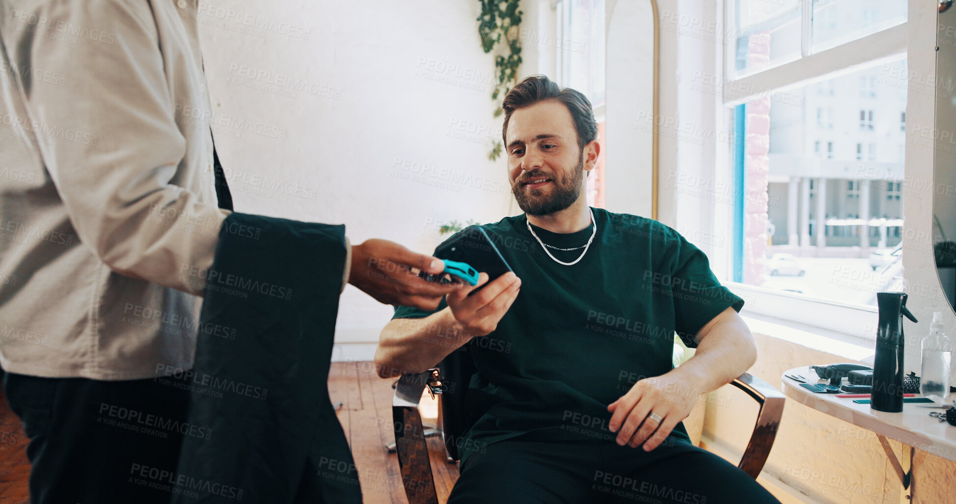 Buy stock photo Happy man, hairdresser or customer paying with phone for payment, banking or pos machine in salon. Male people, barber or client with mobile smartphone for NFC tap or wireless transaction in parlor